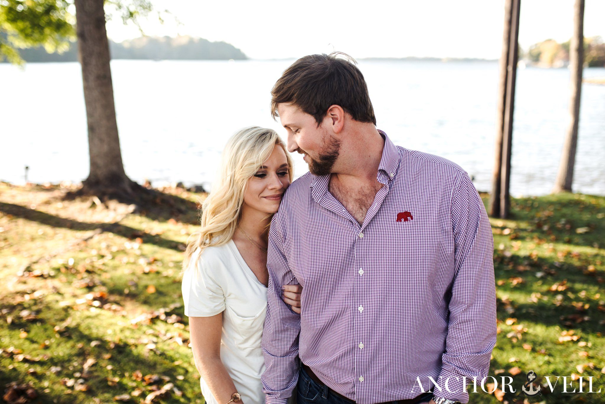 holding each other during the belews lake engagement session