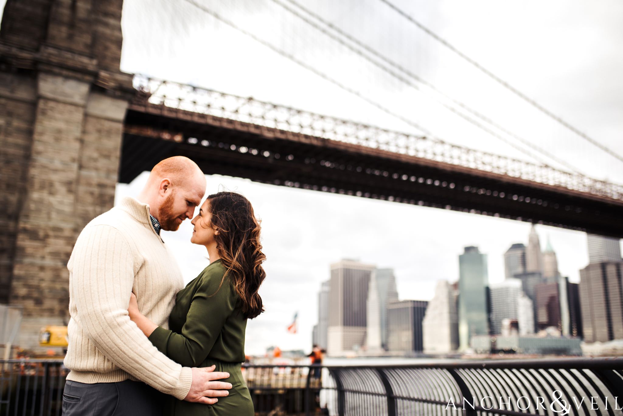 Brooklyn bridge During their Dumbo Brooklyn New York engagement session