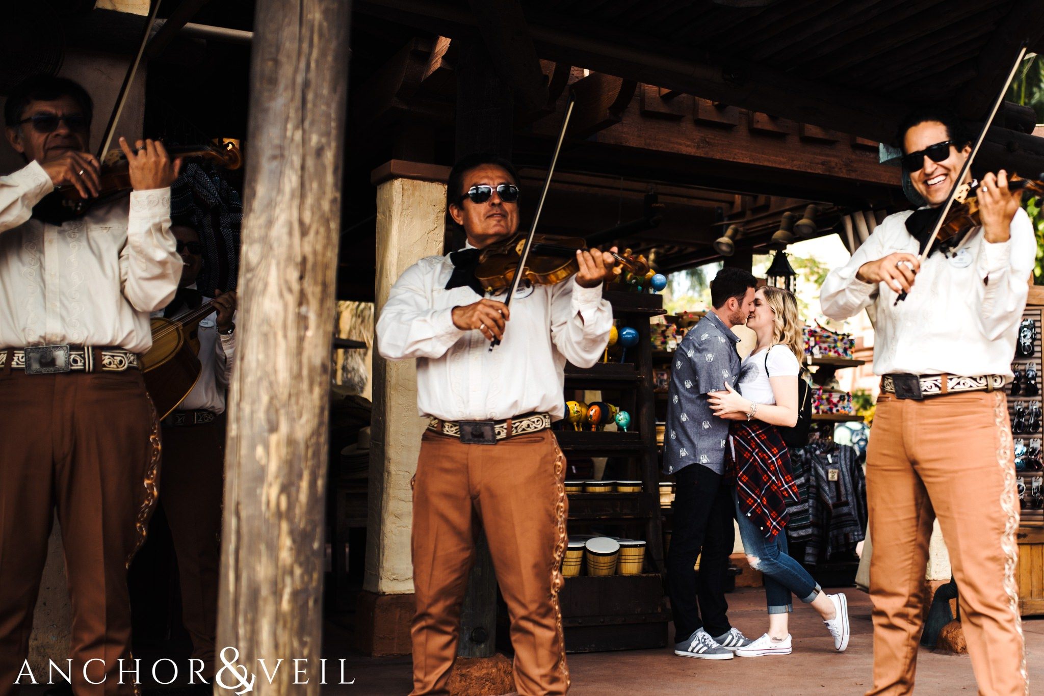 with the band in Mexico during their Disney world engagement session at Disney's Epcot
