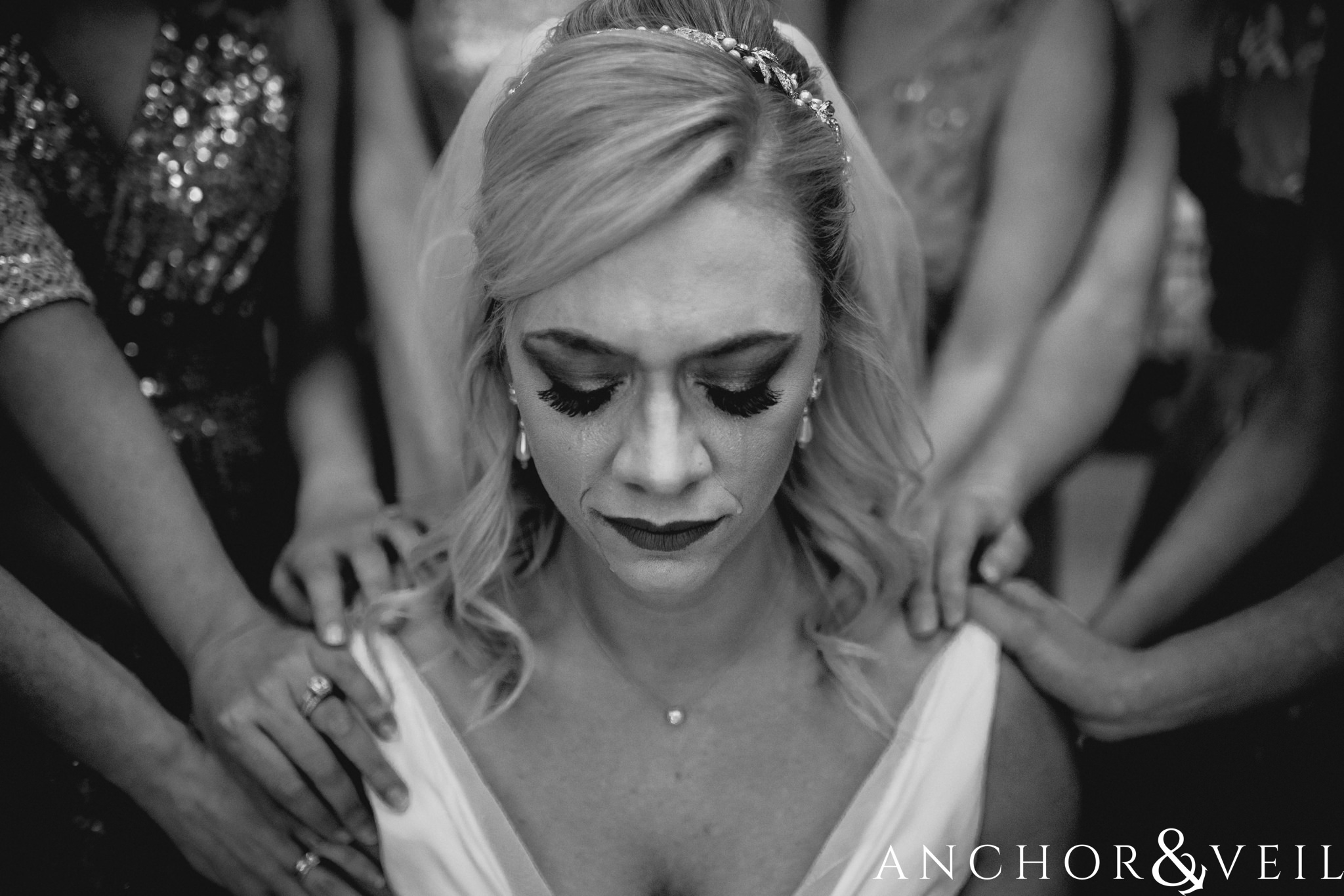 crying with her girls during their Alabama Museum of Natural History Wedding