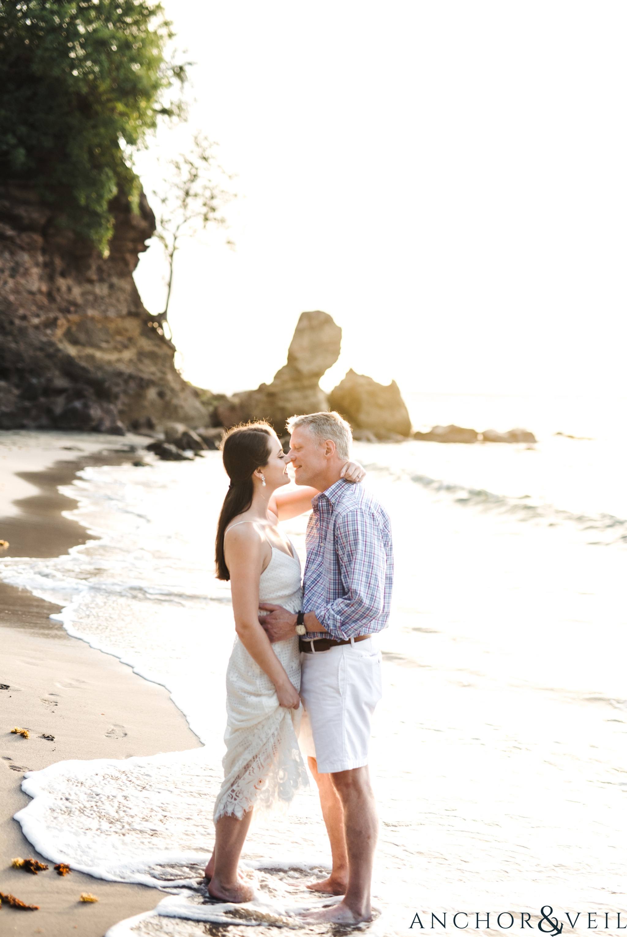 walking on the beach and kissing During their Cap Maison destination Wedding In St Lucia
