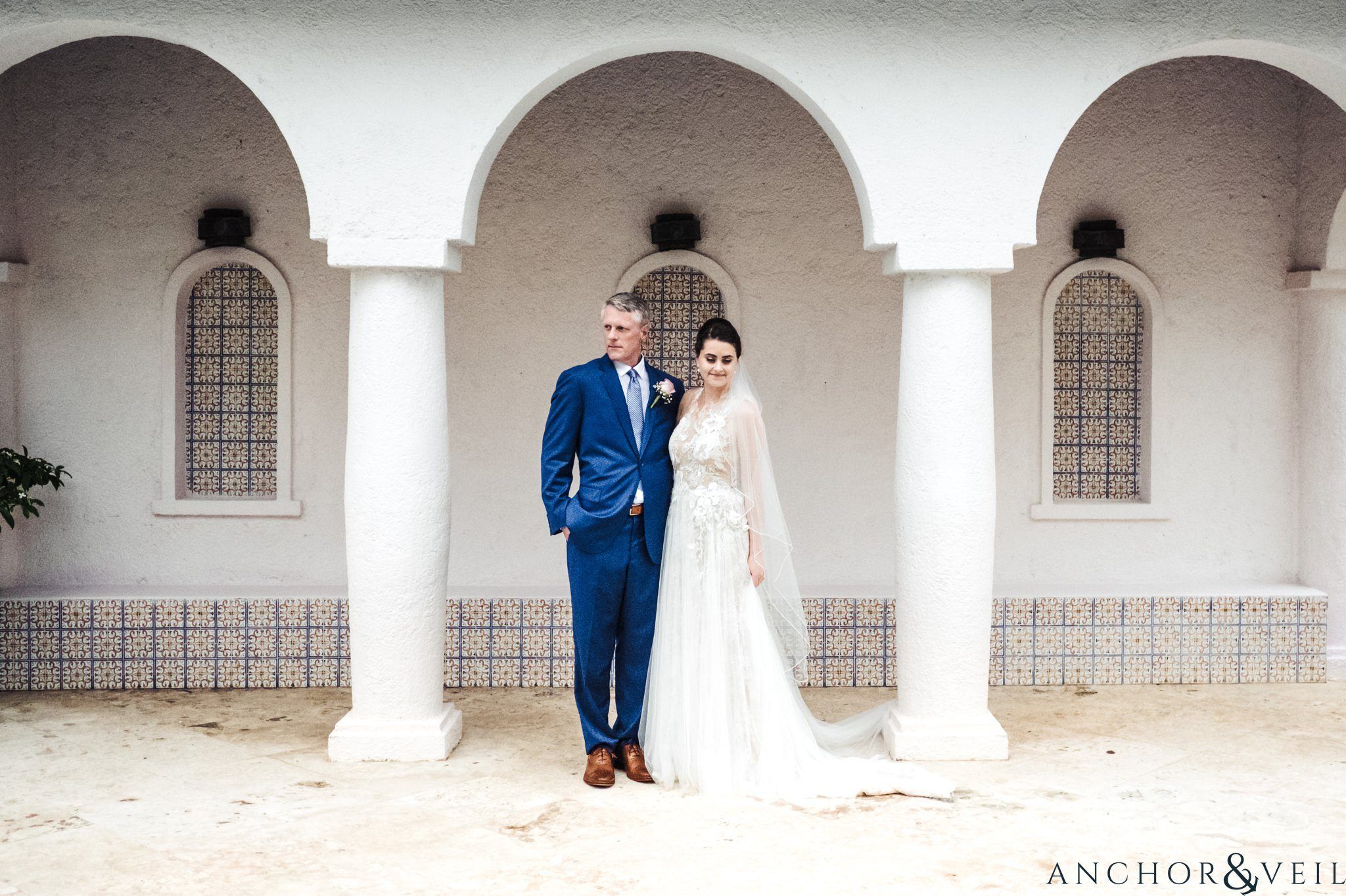 bride and groom under the arches During their Cap Maison destination Wedding In St Lucia