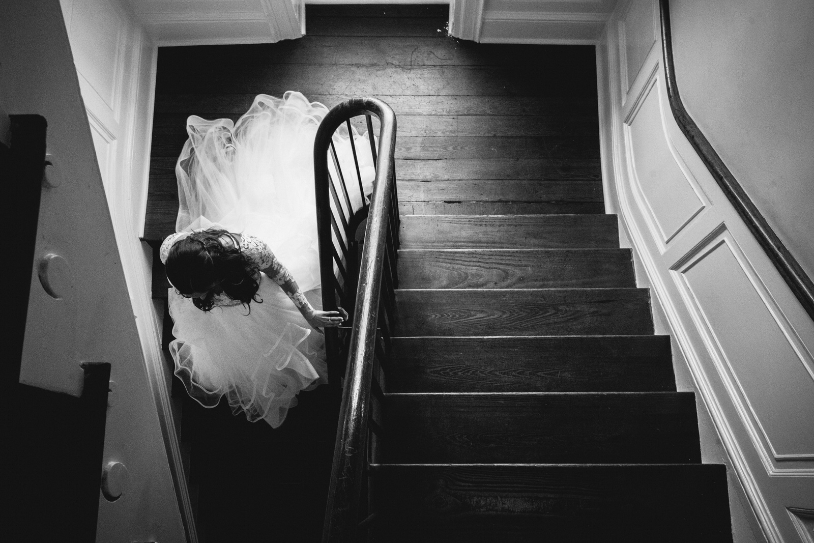 bride walking down the gorgeous staircase