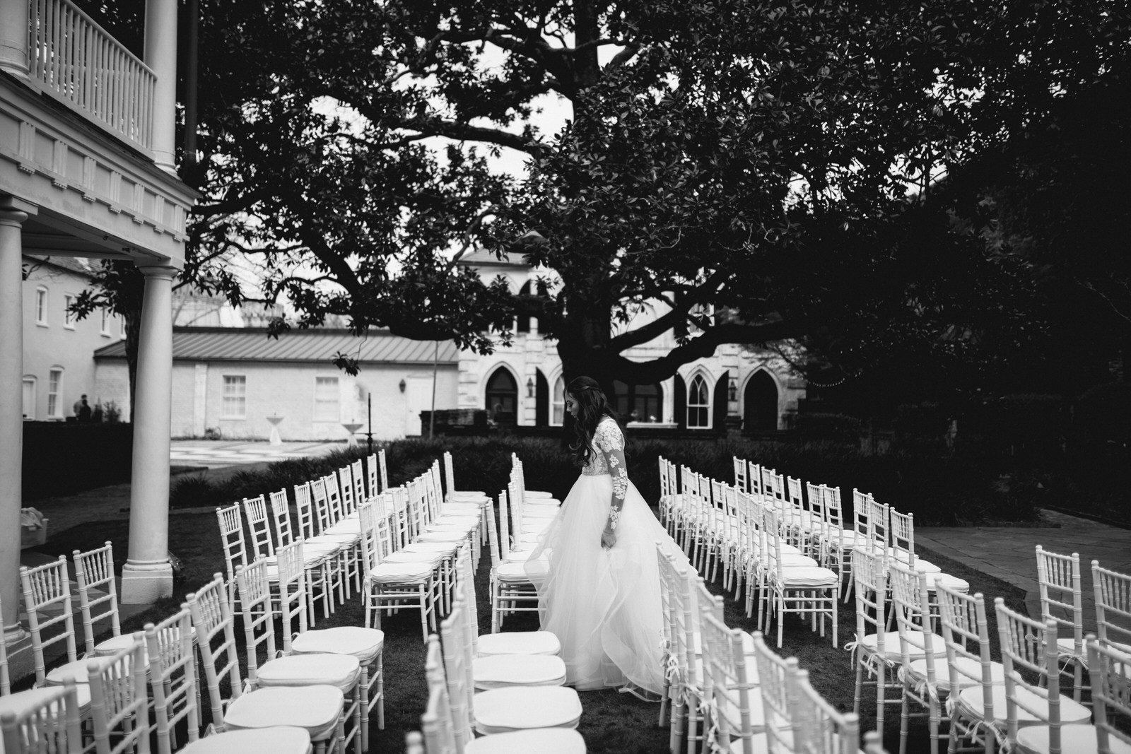 bride walking through the chairs