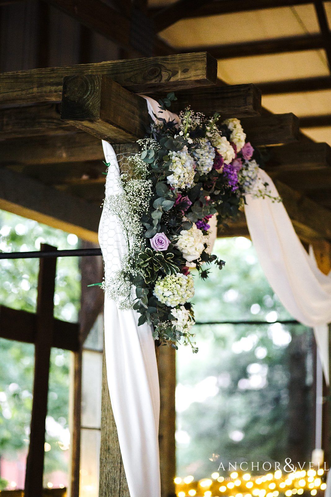 Floral decorating on the archway at The Farm at Brusharbor Wedding