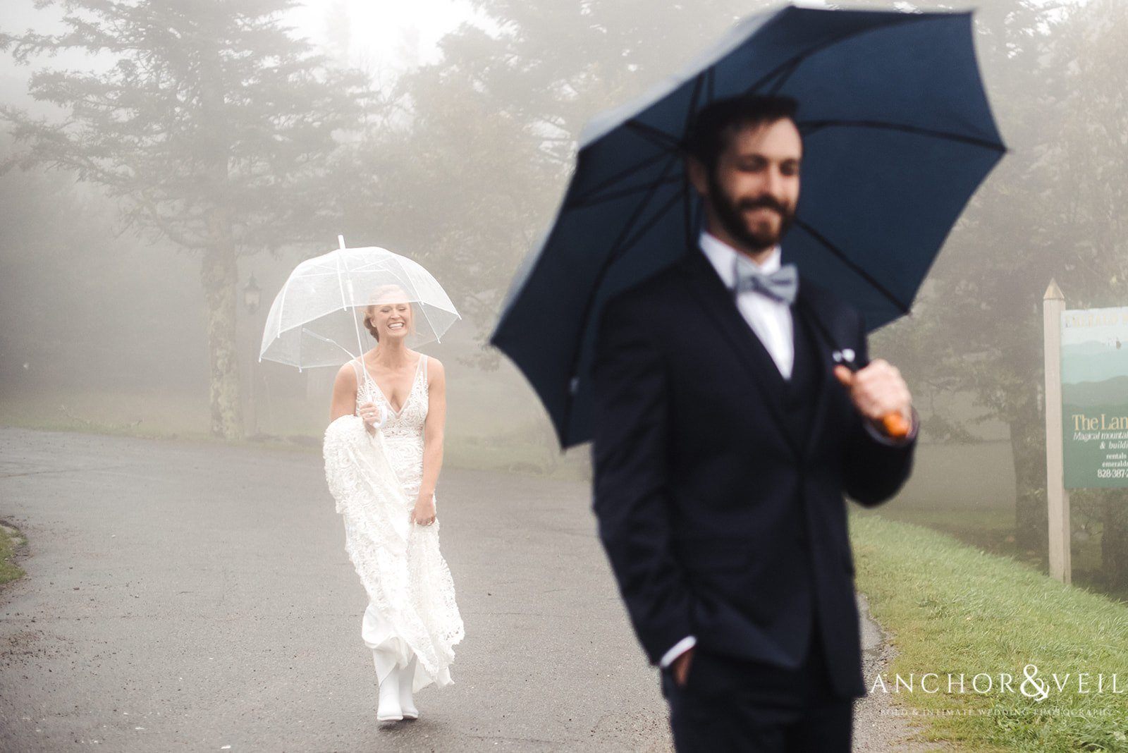 The bride and groom under umbrella at the Beech Mountain Ski Resort Wedding