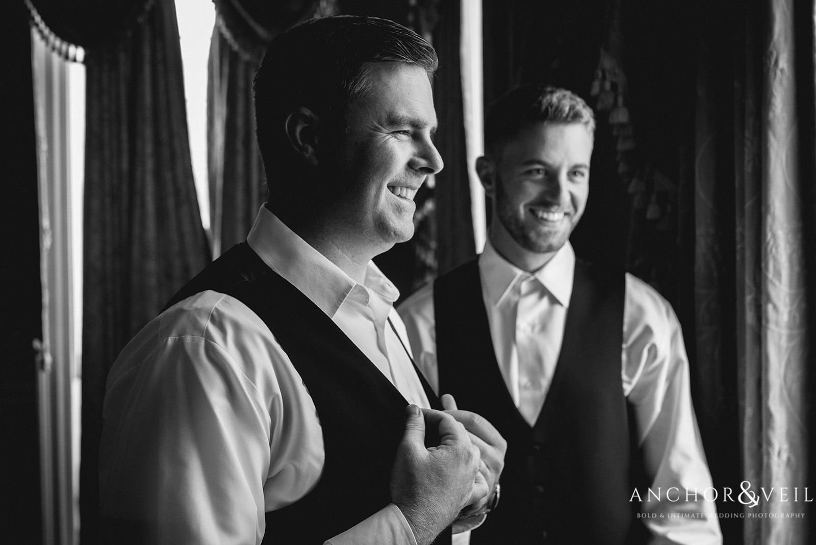 A good laugh for the groom at the Lowndes Grove Plantation Wedding