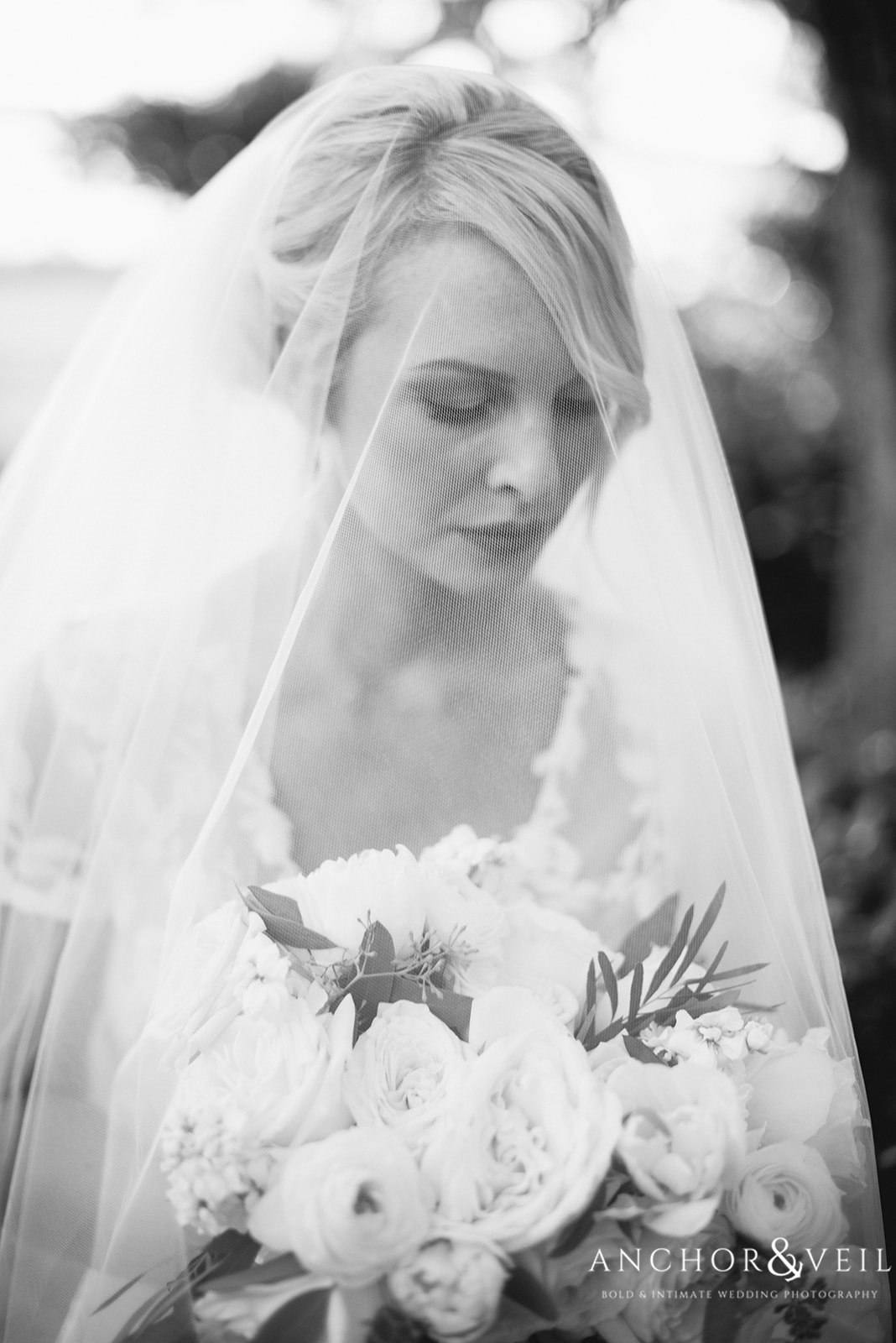 The beautiful bride under her veil at the Lowndes Grove Plantation Wedding