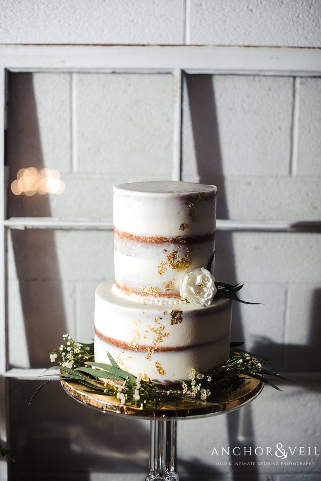 The simple wedding cake at the Circle M Farms Wedding 