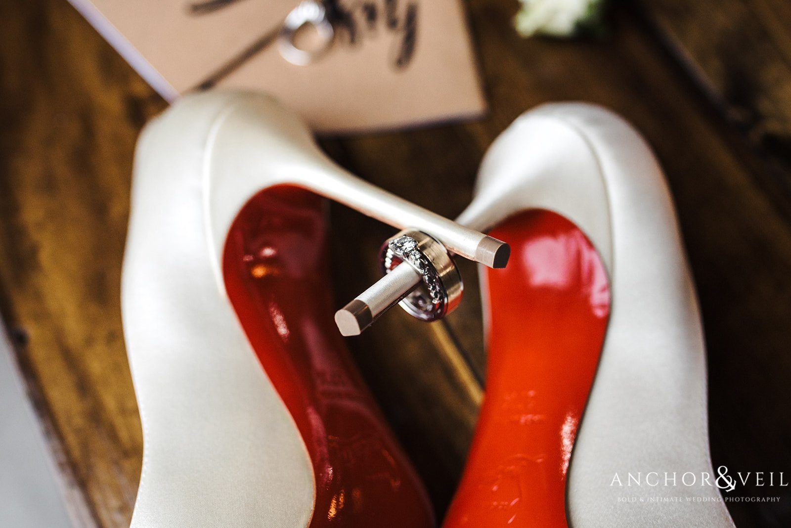 Red bottom shoes and wedding rings at the Circle M Farms Wedding